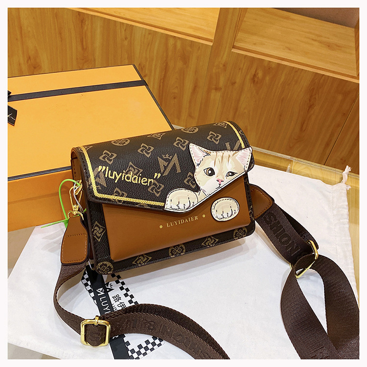 Bolso bandolera para mujer 2024, nuevo y moderno bolso bandolera con correa ancha y diseño de gato de dibujos animados, bolso de moda de alta gama para mujer._voghion.com