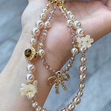 复古美拉德香槟色珍珠手机链女高端轻奢精致挂饰小众钥匙扣包挂件