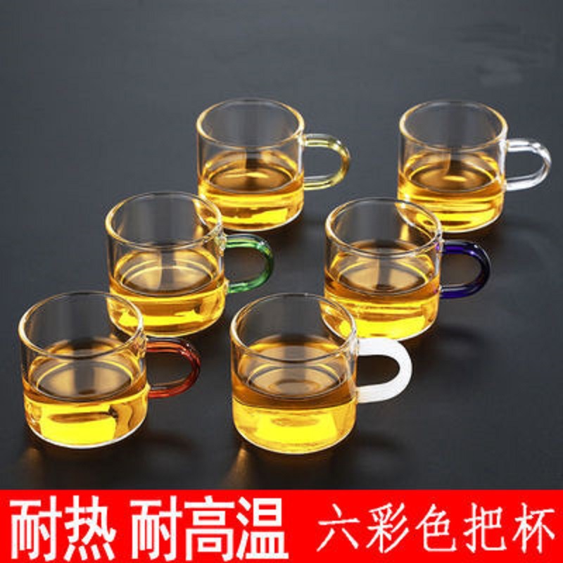 Venta al por mayor de vidrio borosilicato pequeña taza de té mango de color taza de vidrio con mango taza de té de Kung Fu transparente