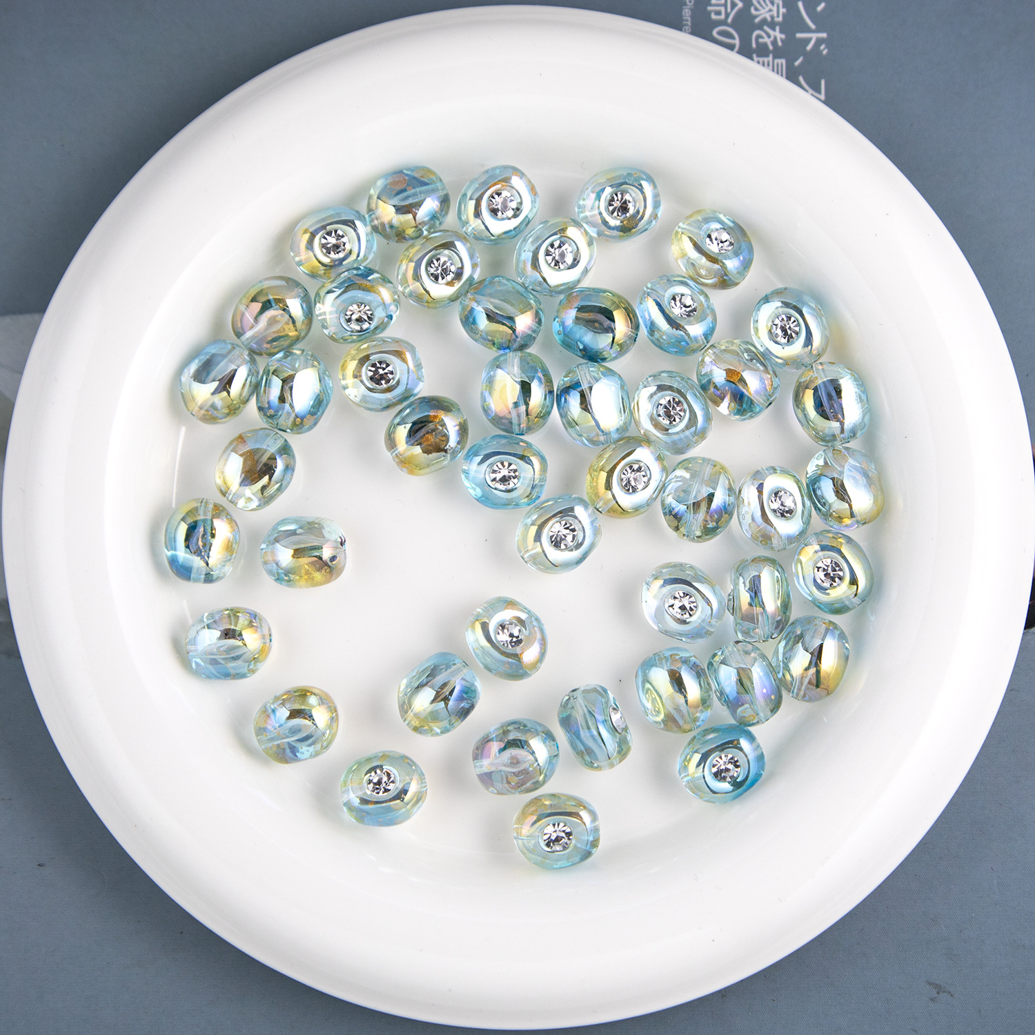 Acrylic beads with zircon