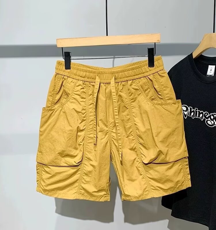 Verano americano, pantalones cortos de bolsillo verde, pantalones casuales para hombres, pantalones de playa, pantalones de pelo