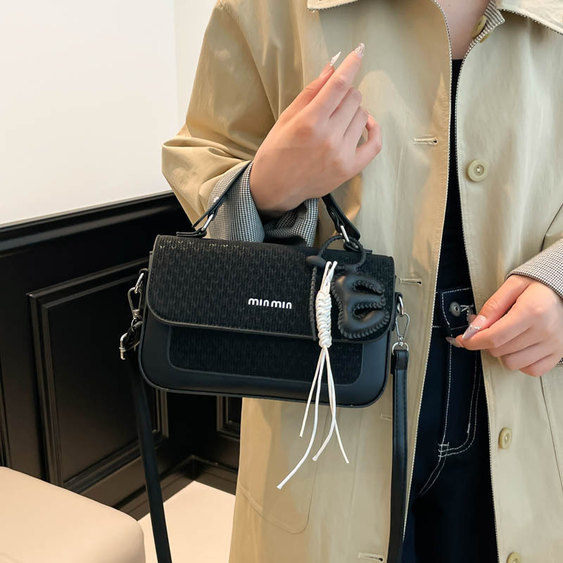 Textura al por mayor de lujo ligero bolso de mano bolso de mujer otoño 2025 nuevo estilo extranjero empalme bolso de hombro bolso de viaje