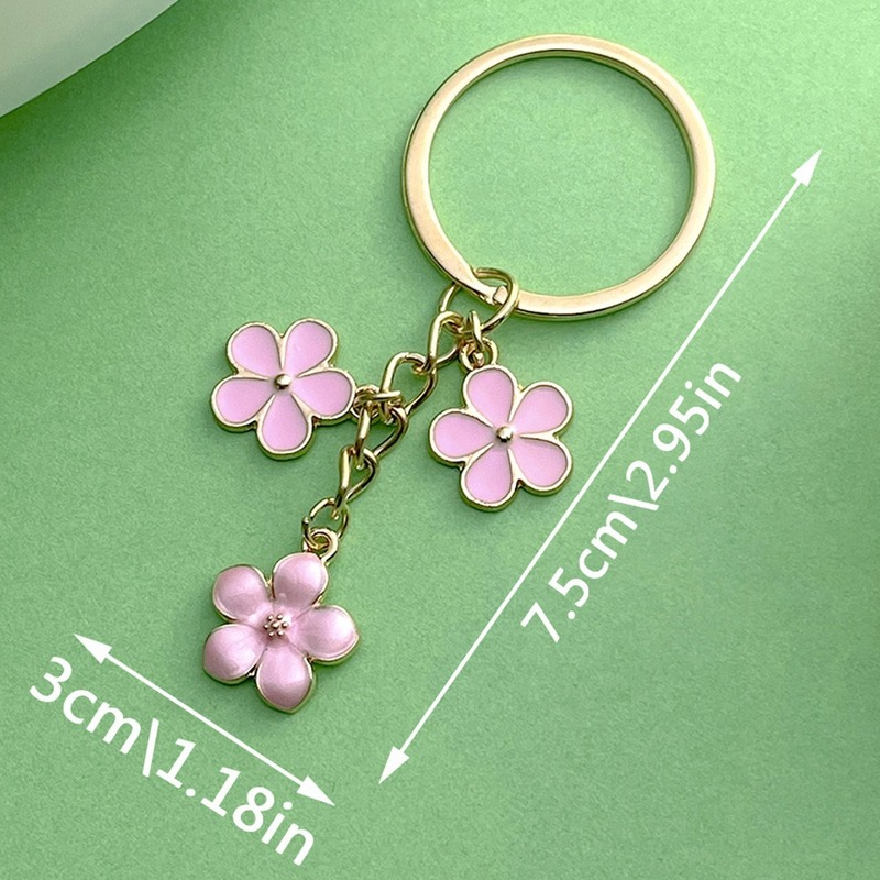 国境を越えた人気の真珠光沢のあるオイルドリップフラワーキーホルダー大きな桜の花びらシンプルなスタイルのUディスクバッグエアポッド小さなペンダント|undefined