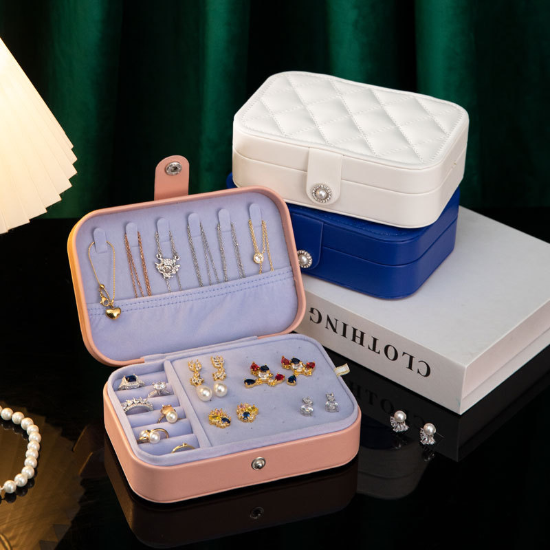 Nueva caja de joyería portátil de lujo ligero caja de joyería de estilo europeo y americano de alta gama de moda de alta calidad PU caja de almacenamiento de joyería transfronteriza