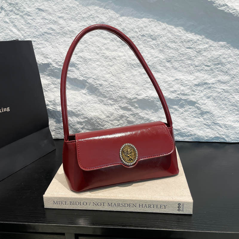 Este año, bolsas de brazo de moda populares 2025, bolsas de hombro de mujer retro de gran capacidad, bolsas de tendencia de estilo extranjero, bolsas pequeñas