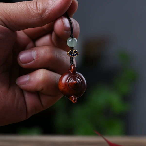 Teapot rosewood, small mobile phone
