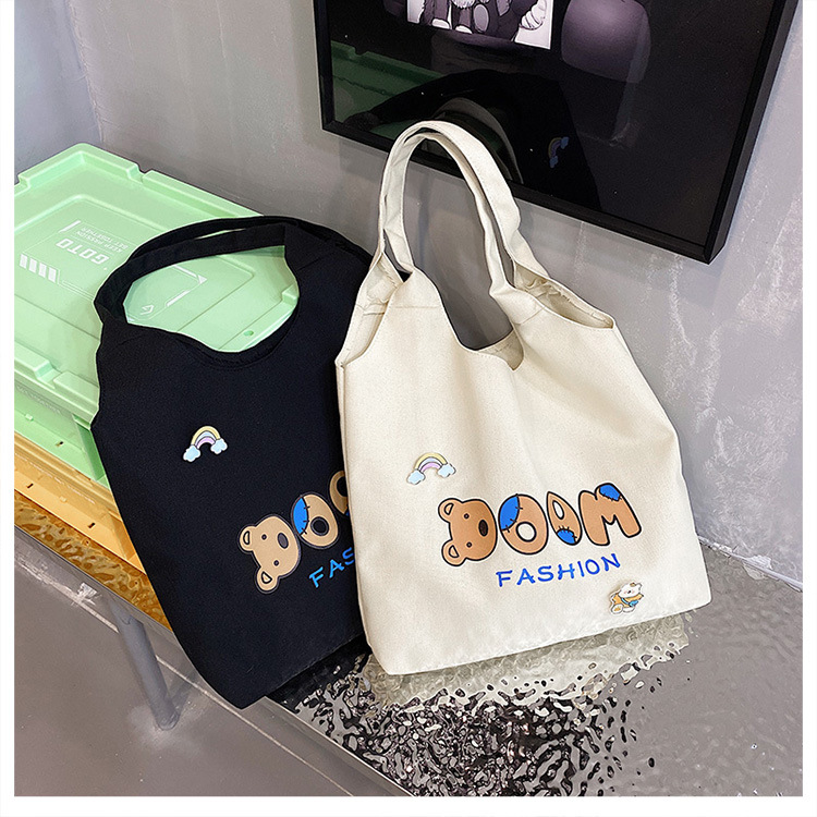 2021 Summer Japanese-style simple canvas bag, student backpack, single-shoulder handbag for going out, cartoon badge cotton bag undefined