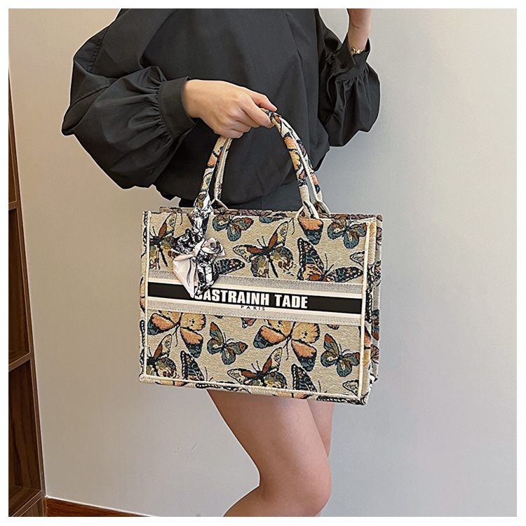 Comercio exterior transfronterizo al por mayor bolso de mano para mujeres 2024 nueva moda impresión popular tamaño de mariposa bolso de hombro