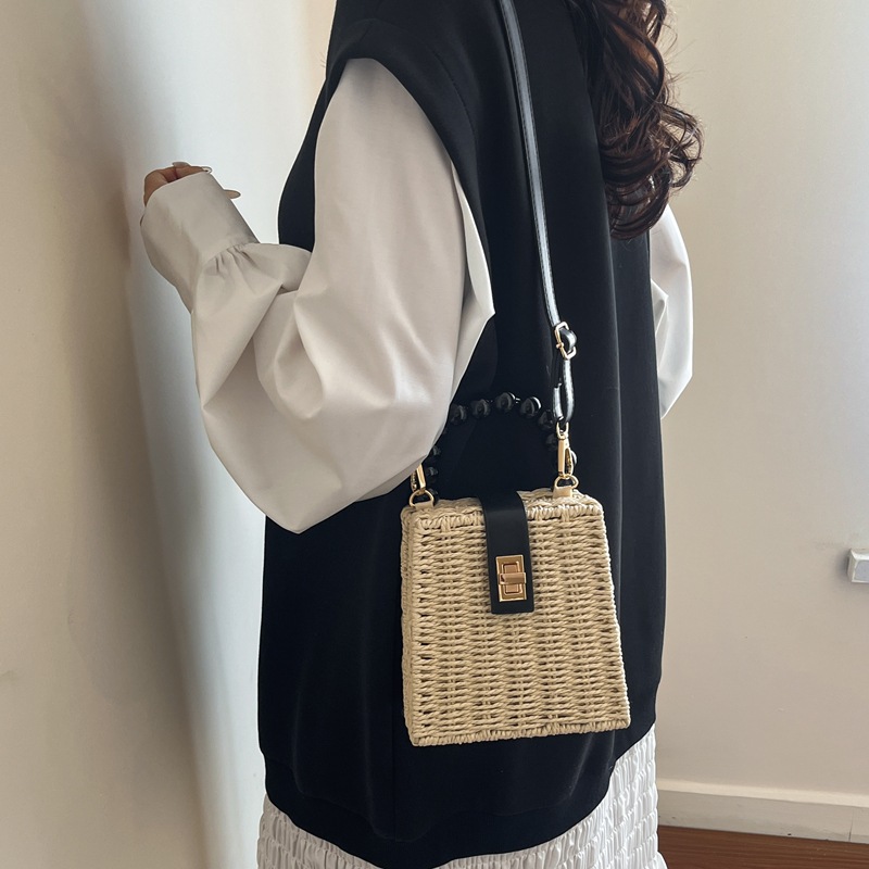 Bolsa de bambú de verano para mujeres 2026 nuevo cubo de caña bolso de tela de paja mini tela de tela portátil bolsa de tejido