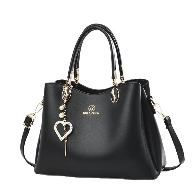 Bolso de moda simple bolso grande primavera y verano nuevo bolso de mensajero de un solo hombro salvaje estilo coreano bolso de mujer de mediana edad bolso de madre