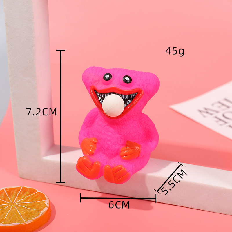 Juguete antiestrés de dibujos animados de niña apretando burbujas, juguete antiestrés de pequeño animal, gadget antiestrés de monstruo verde de Halloween.