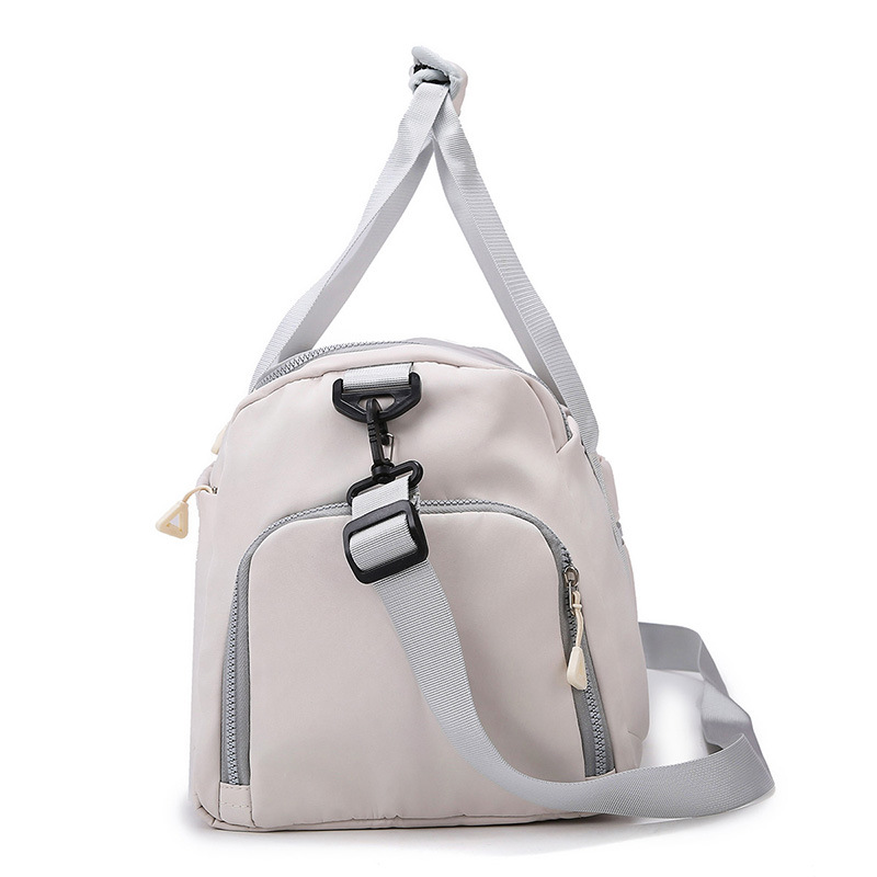 Nueva bolsa de viaje portátil transfronteriza, bolsa de almacenamiento de equipaje de viaje de viaje de corta distancia, bolsa de yoga de entrenamiento deportivo para mujer