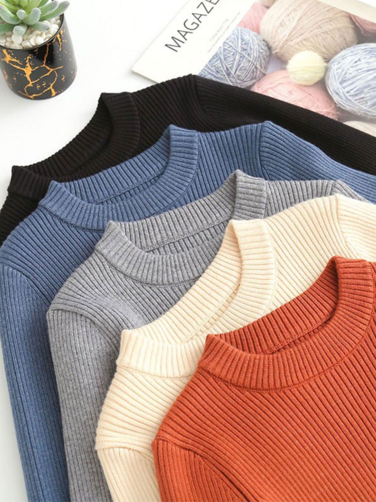 Children's demi-season sweater with a round collar