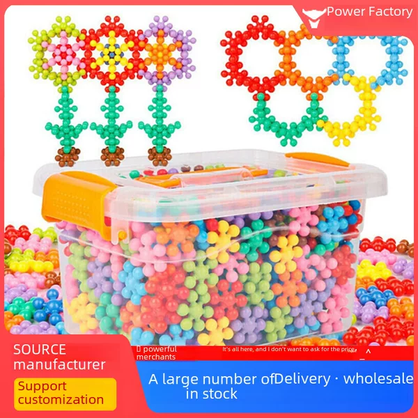 A Drop-Shipping Plum Blossom Building Blocks, Rotating Snowflakes, Three-Dimensional Inserts, Plastic Assembled Educational Toys for Kindergarten Children