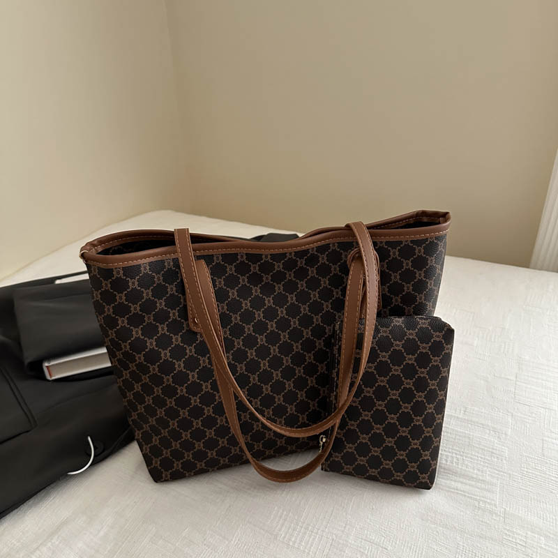 Bolso de alta calidad de gran capacidad 2025 nuevo bolso de viaje de todo fósforo de nicho para mujer bolso de niño de moda para mujer bolso portátil para mujer