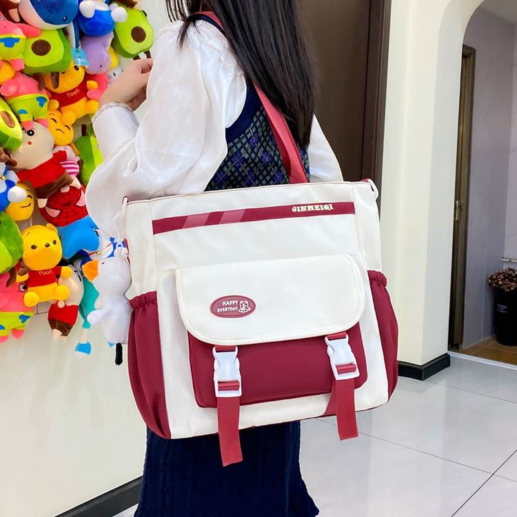 Capacious shoulder bag