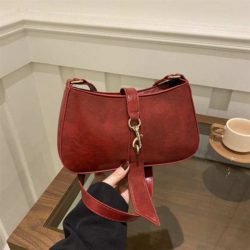 Bolsa de brazo francesa nicho para mujeres 2025 primavera y verano nueva moda moda personalidad bolso de palo estilo coreano bolso de hombro retro