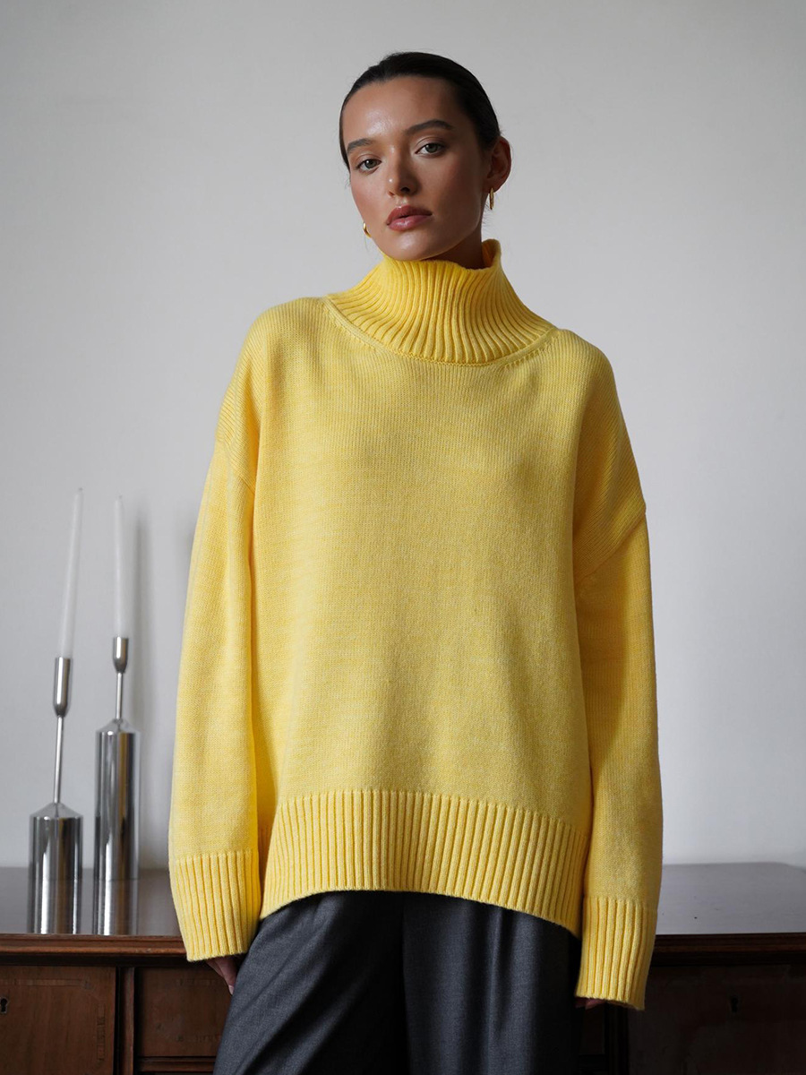 Suéter de cuello alto transfronterizo para mujeres 2025, Europa y los Estados Unidos de otoño y invierno explosivo color sólido jersey de punto de cuello alto suéter suelto para mujeres