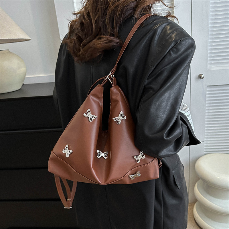 Bolsa de hombro de textura de la atmósfera en línea para mujeres 2023 otoño y invierno nueva bolsa de brazo coreana para mujeres bolso especial