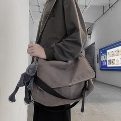 潮牌工装斜挎包男士邮差休闲日系大容量单肩ins运动学生斜肩包女