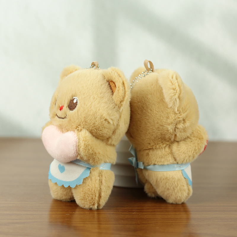 Red celebridad amor mantequilla oso muñeca colgante bolsas escolares muñeca de peluche de dibujos animados pequeña muñeca colgante llavero