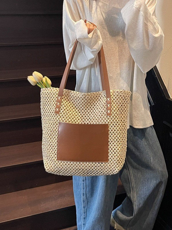 Bolsa de verano tejida para mujeres 2026 nueva moda de gran capacidad bolsa de playa de vacaciones multifuncional bolsa de hombro de alta calidad