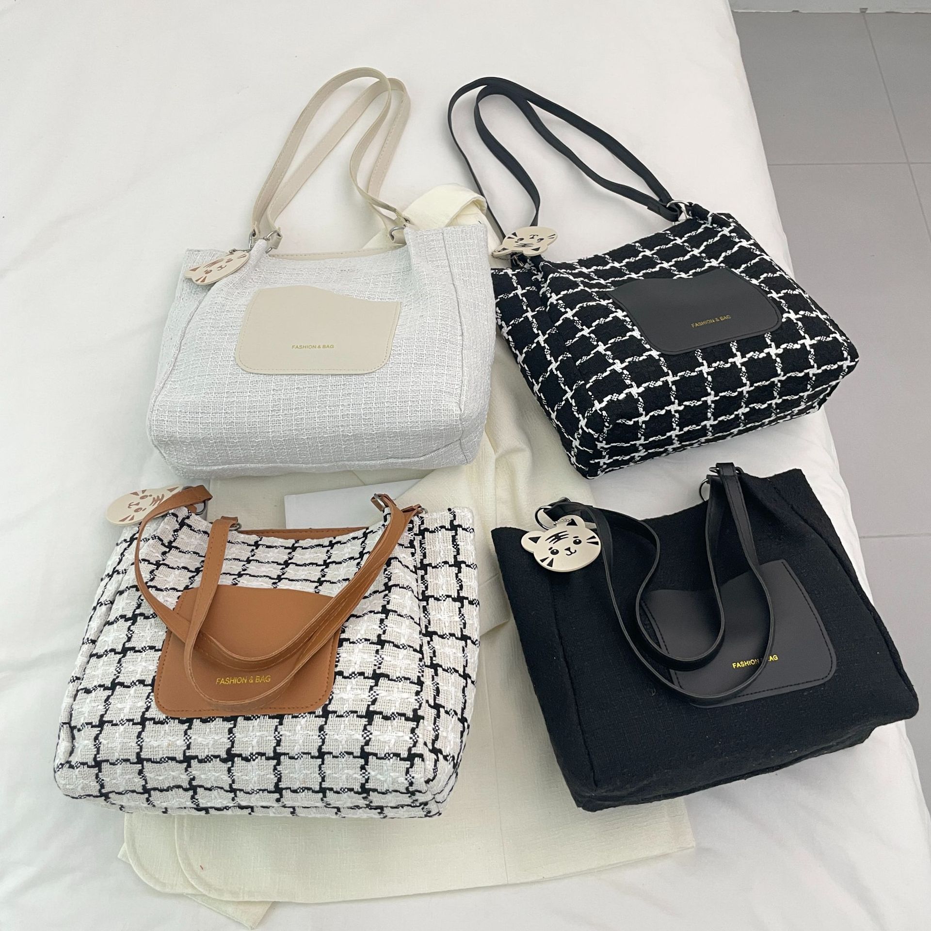 Diseño de nicho bolsos de punto para mujeres 2024 nuevos bolsos de moda de moda bolsos de hombro retro bolsos especiales de cercanías a cuadros