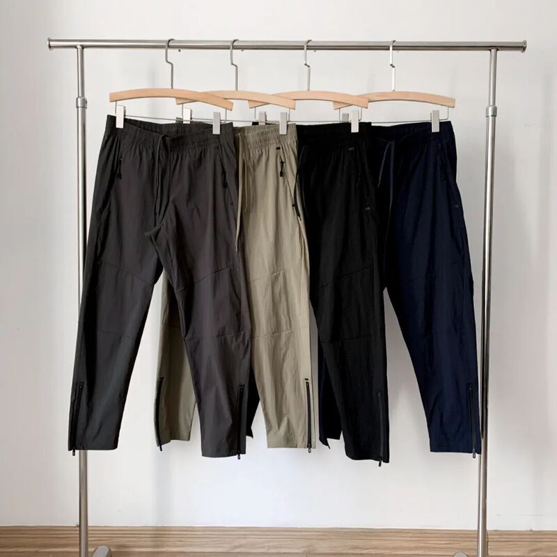 26 New Summer Style Men's and Women's Lightweight Quick-Dry Pants with Zipper at the Leg, Drawstring Elastic Waist, Water-Resistant Casual Pants 26 New Summer Style Men's and Women's Lightweight Quick-Dry Pants with Zipper at the Leg, Drawstring Elastic Waist, Water-Resistant Casual Pants