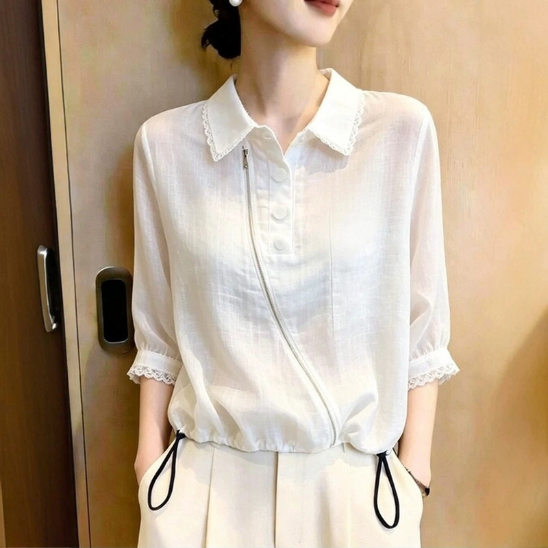 White women's shirt in a commuter style with lace trim, turn-down collar, drawstring waist, super stylish and fashionable, new model for 2026 White women's shirt in a commuter style with lace trim, turn-down collar, drawstring waist, super stylish and fashionable, new model for 2026