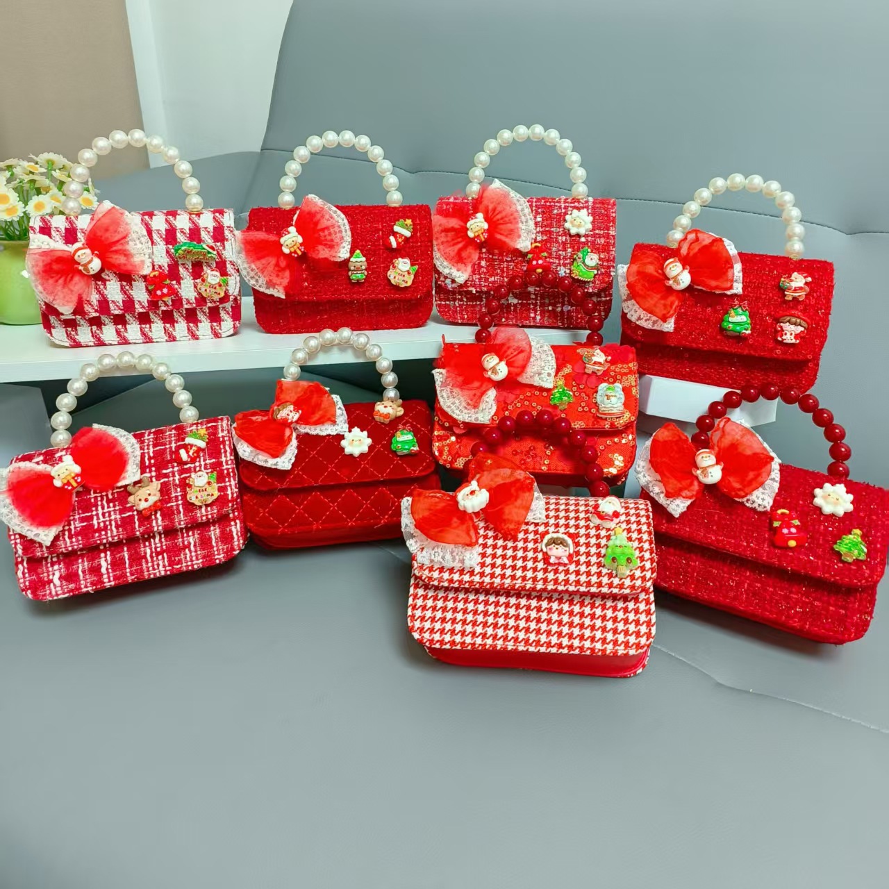 Cartera de Año Nuevo rojo arco de papá Noel bolso de perla pequeña cadena de viento fragante bolso de hombro