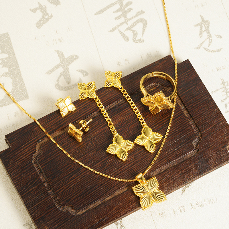 Anillo de collar de flores de cuatro hojas de oro vietnamita para mujeres de verano de alto nivel de lujo ligero conjunto de joyas de lujo auriculares al por mayor