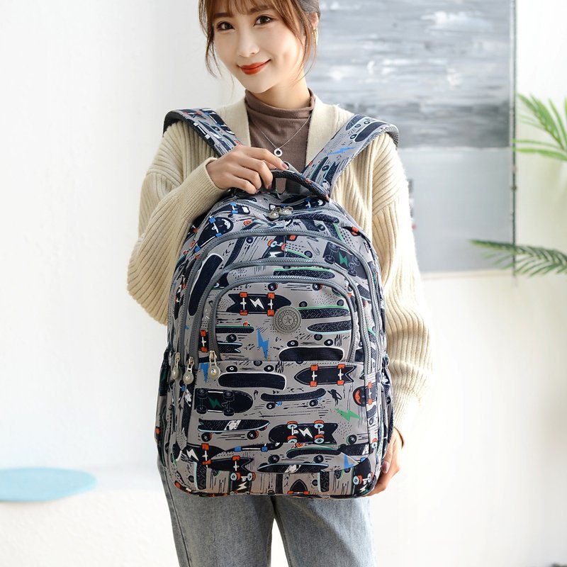 Nueva mochila transfronteriza tendencia de bolsas escolares de estudiantes de secundaria bolsas de nylon de gran capacidad mochila mono colgante