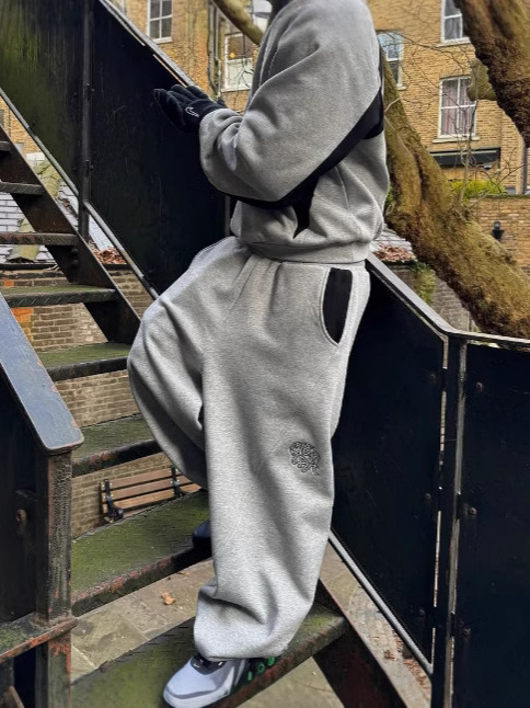 Europa y Estados Unidos transfronterizos americanos retro versátil suelto hip-hop empalme bordado pantalones de hombre comercio exterior