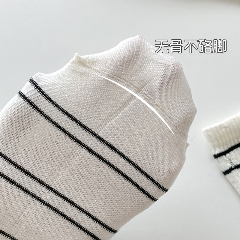 Piles de calcetines a rayas de mujer personalidad de tendencia otoño-invierno calcetines de algodón sin hueso al por mayor