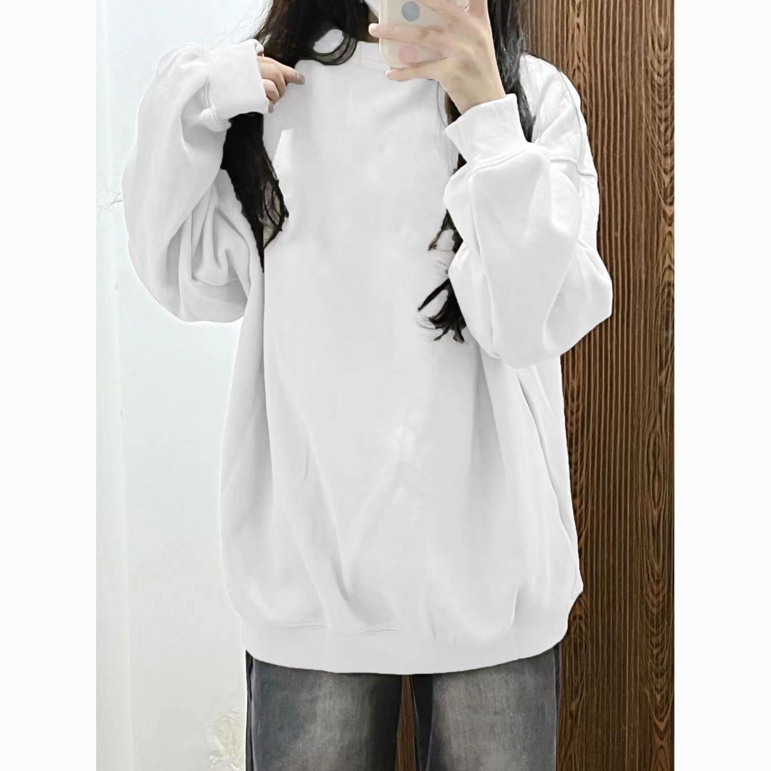 2025 marca de moda de Hong Kong blanco y negro suelto camiseta de cuello redondo de manga larga camiseta de mujer multifacé vestido en la parte superior pareja