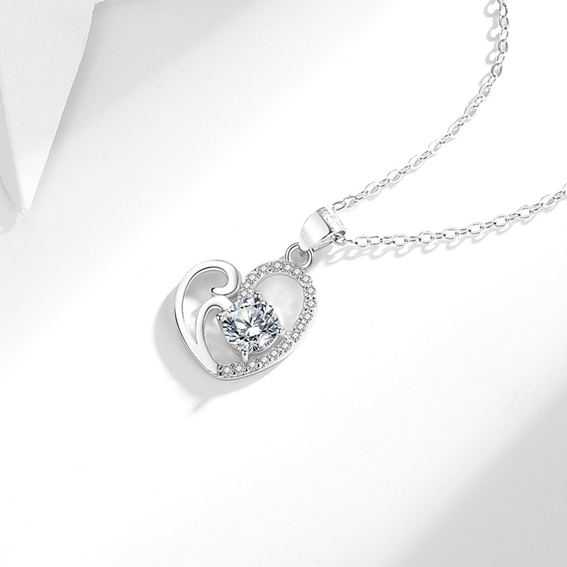 Amor collar femenino S925 plata estilo japonés y coreano corazón ondulación de lujo dulce cadena clavícula fábrica al por mayor