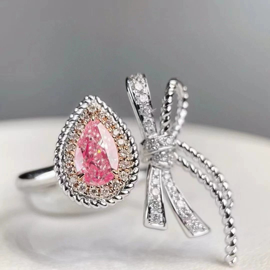 0.600ct18k инкрустированный натуральный пудр капельное кольцо чистоты против международного сертификата Модная бабочка кольцо