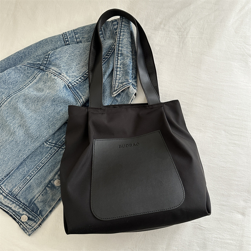 Bolso de mano simple 2024 invierno nuevo bolso de ocio versátil ains este año, bolso de hombro coreano para mujeres