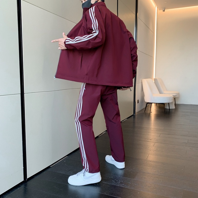 Primavera y otoño transfronterizos chaqueta delgada ropa deportiva hombre ocio tres barras juego de deporte de correr al aire libre dos piezas juego de comercio exterior