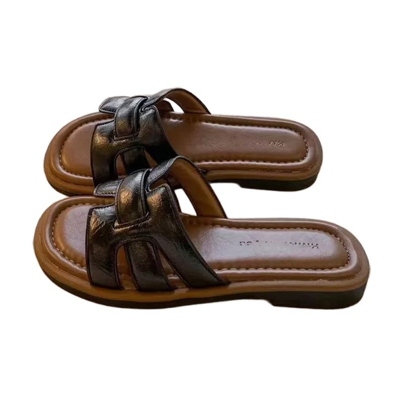 Sandalias y pantuflas retro francesas con una sola palabra para mujer 2025 nuevo estilo exterior zapatos Muller tejidos con cabeza cuadrada zapatillas de playa de suela blanda