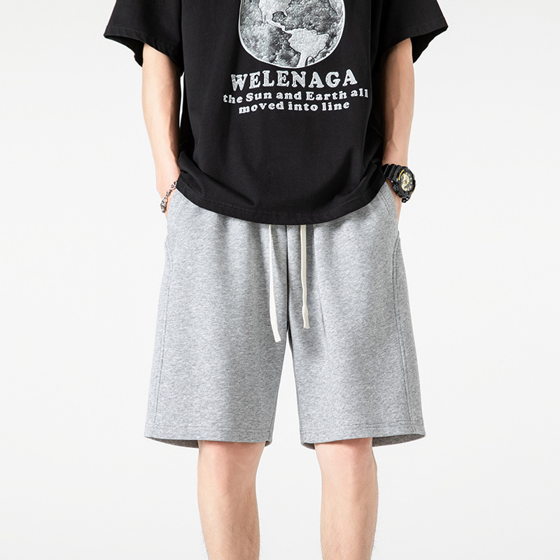 Pantalones cortos deportivos de punto de algodón chino 2025 nuevos productos de verano estilo básico calle sueltos pantalones de cinco puntos de marca de moda americana
