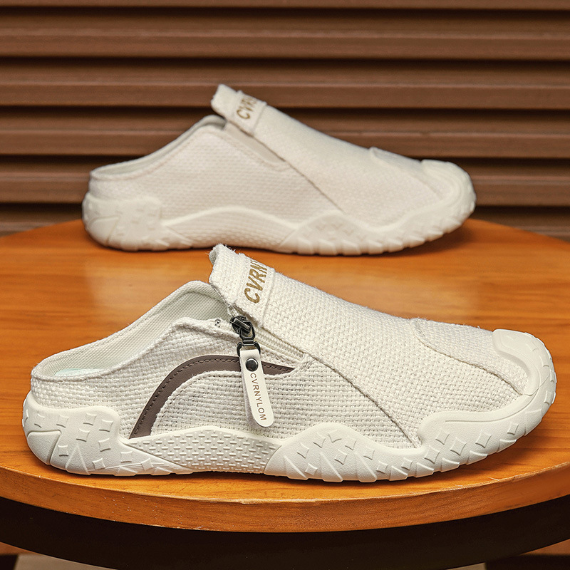Zapatos para hombres verano 2026 nuevo estilo anti-deslizante transpirable para hombres medio-remolque de moda versátil zapatos de skate de lona de un pie