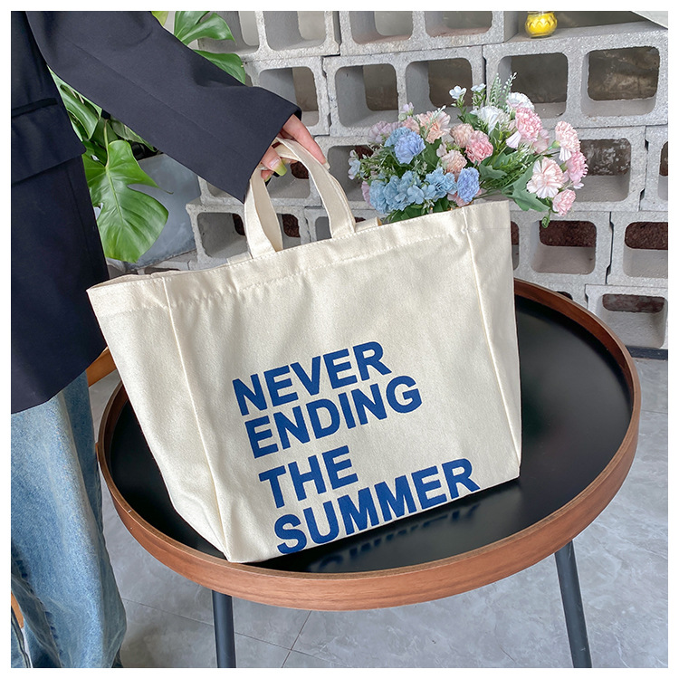 A large-capacity, sturdy Japanese-style canvas bag for women, a new 2022 simple bento handbag for girls to go to work undefined