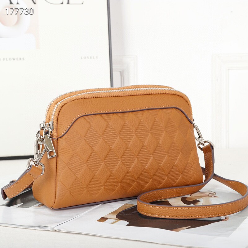 TOGO Pressed and Embossed Cowhide Women's Bag Autumn and Winter New Puffer Dolphin Bag Niche Design Soft Leather Portable Small Square Simple Bag