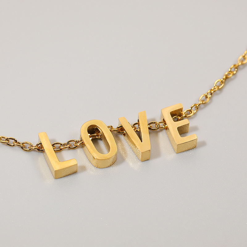 Simple 26 English Letters Titanium Steel Glossy Heart Pendant Clavicle Chain Female display picture 2