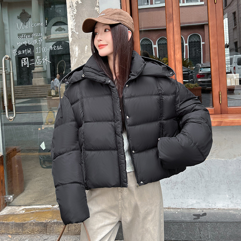 2025 nuevo encapuchado grueso corto de moda de algodón de invierno mujer pequeña chaqueta de algodón de pan caliente
