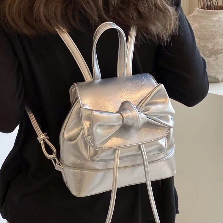 Neue Pendler-Tragetasche für College-Studenten im koreanischen Stil mit Schleife, Herbst und Winter 2025, kleiner Rucksack für lässige Reisen, modisch und vielseitig._voghion.com