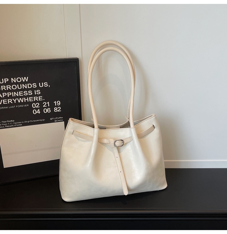Nueva bolsa de hombro coreana para mujeres 2026 simple moda bolso de brazo para viajar al trabajo bolso de gran capacidad