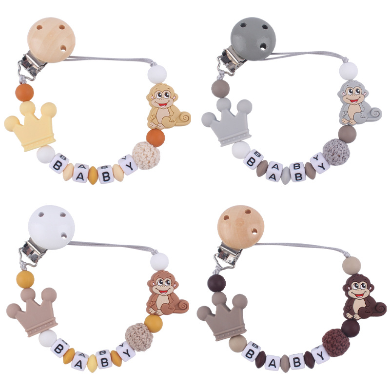 Nuevo bebé suministros de dibujos animados animal mono mordedor creativo bebé DIY mordedura molar Cadena de pezón cadena anti-caída