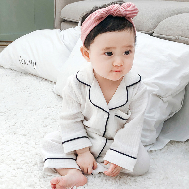 Baby pajamas new baby solid color home pajamas crepe long sleeve jumpsuit baby climbing clothes cross-border wholesale